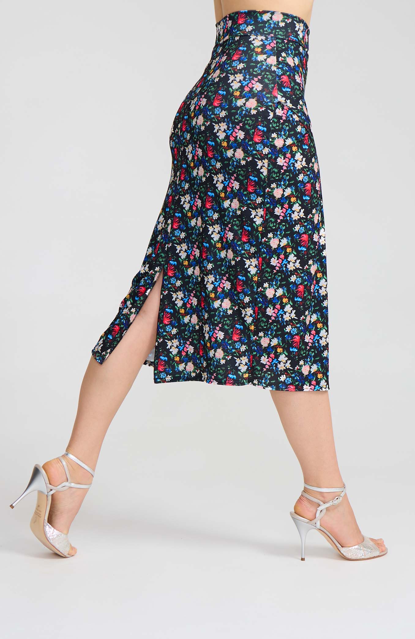 Model wearing the VALERY black floral print overlap tango skirt, designed for elegant movement.