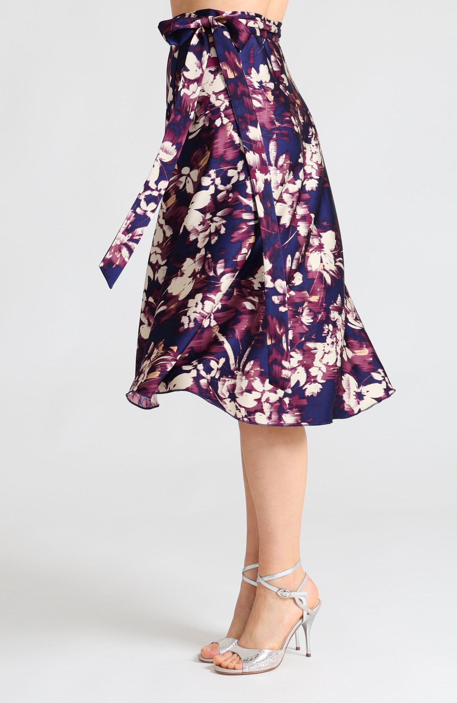 Blue abstract print wrap tango skirt Coco with an elegant side bow.