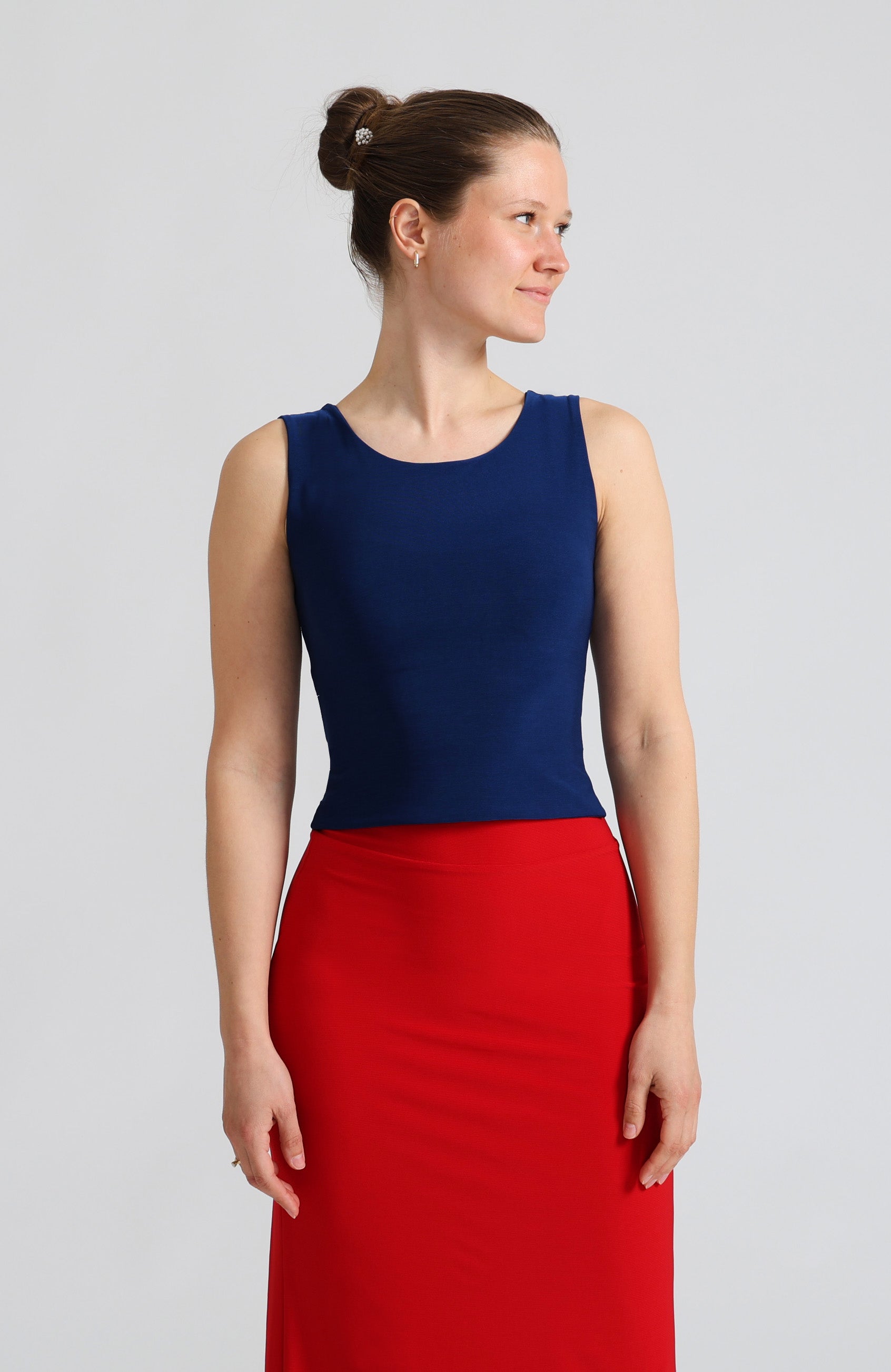 Blue crop top DANIELA with a bateau neckline and open V-back.