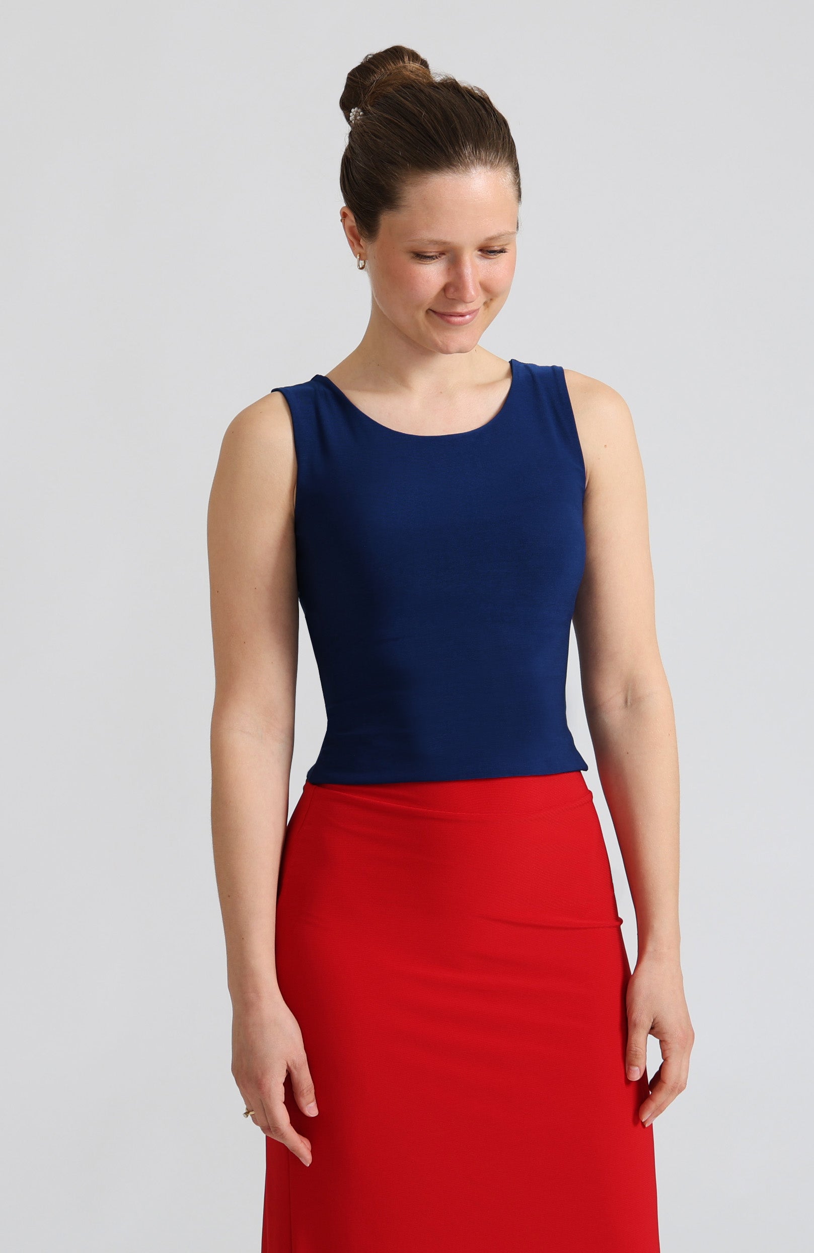 Blue crop top DANIELA with a bateau neckline and open V-back.