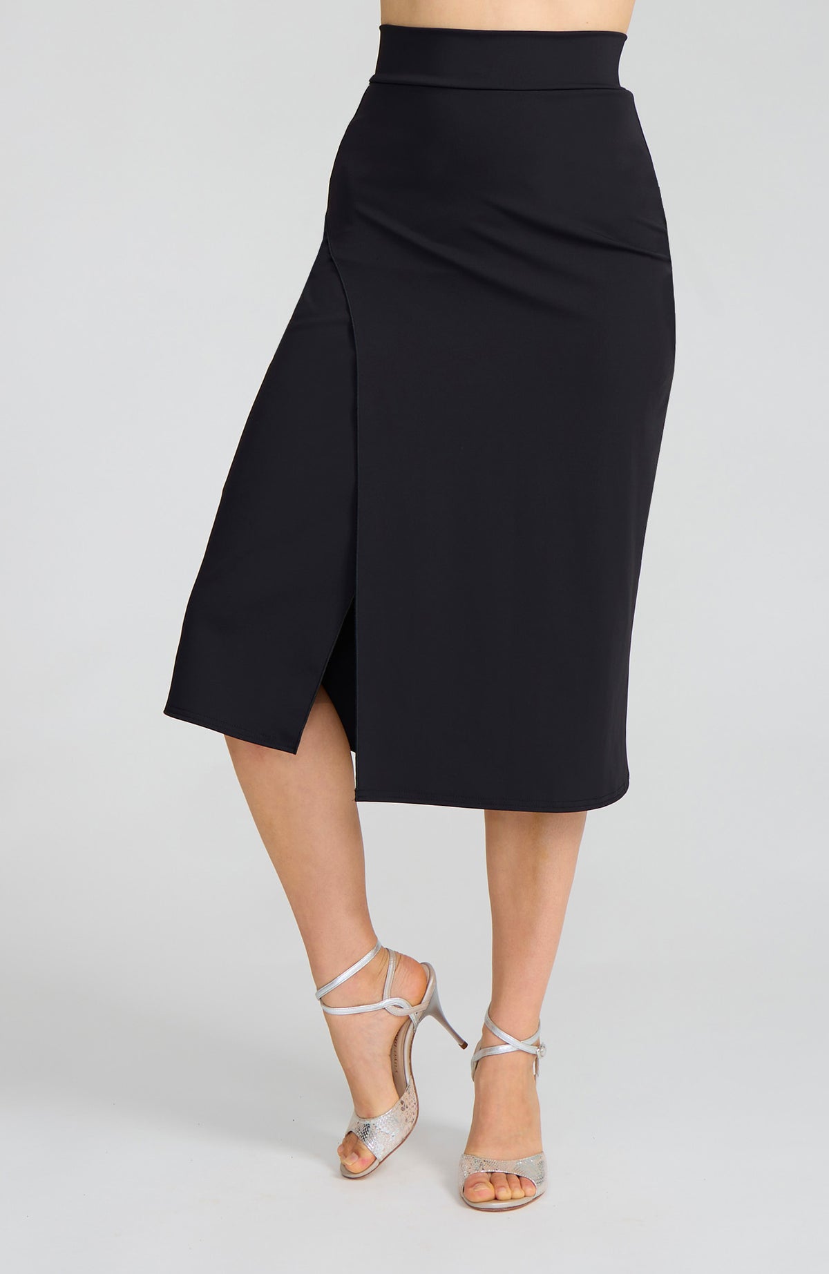 Model wearing the VALERY charcoal black overlap tango skirt on the dance floor.