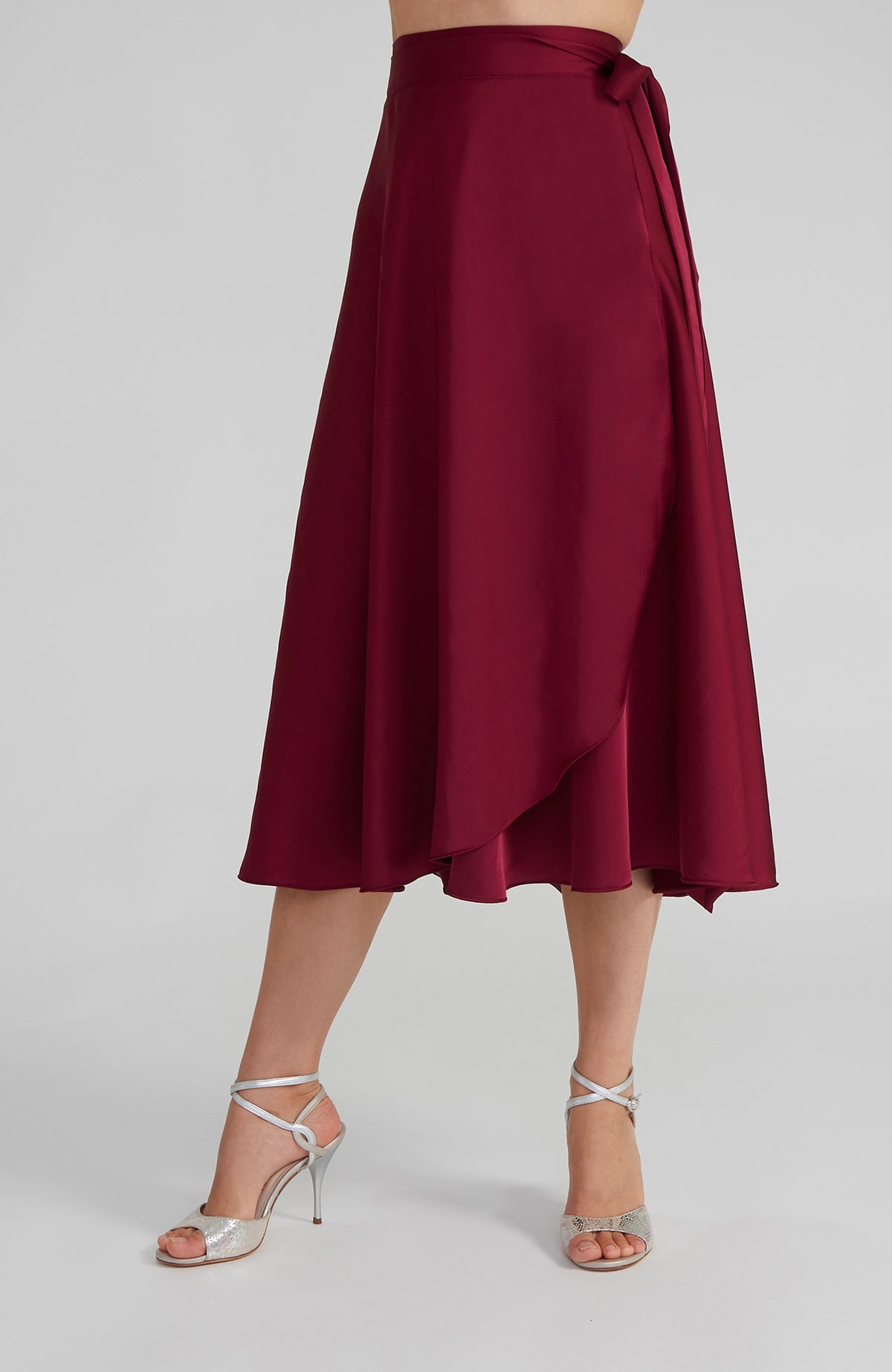 Long Bordeaux red satin wrap skirt GINA with a side-tie waist; an elegant Argentine tango skirt designed for a flowing, elongated silhouette.