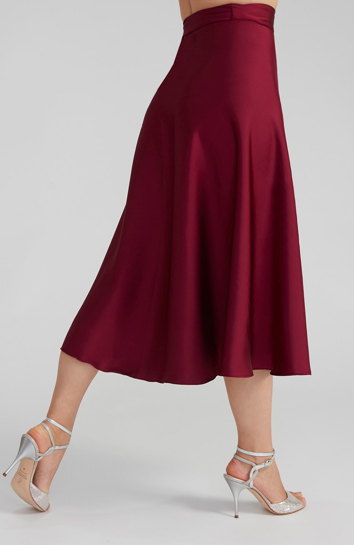 Long Bordeaux red satin wrap skirt GINA with a side-tie waist; an elegant Argentine tango skirt designed for a flowing, elongated silhouette.