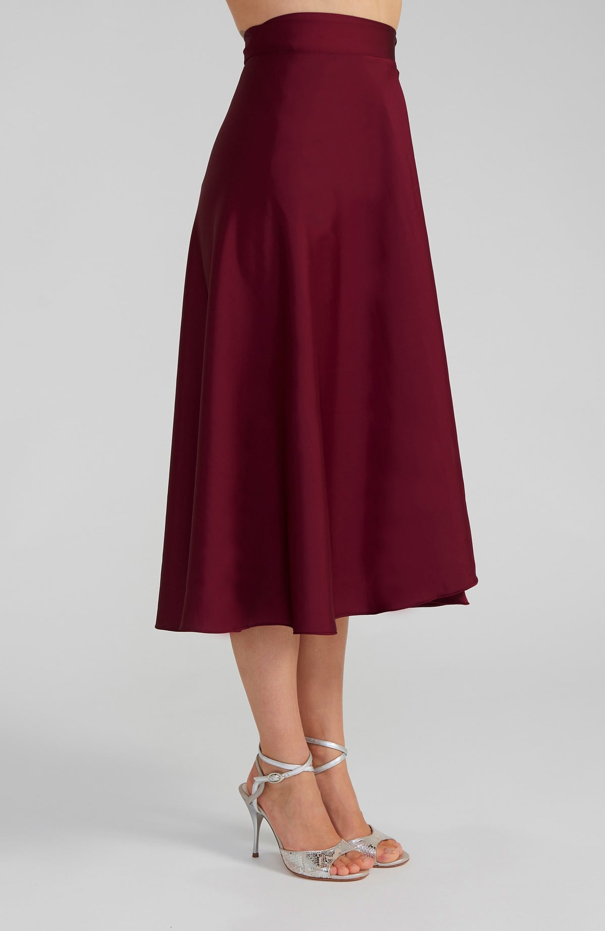 Long Bordeaux red satin wrap skirt GINA with a side-tie waist; an elegant Argentine tango skirt designed for a flowing, elongated silhouette.