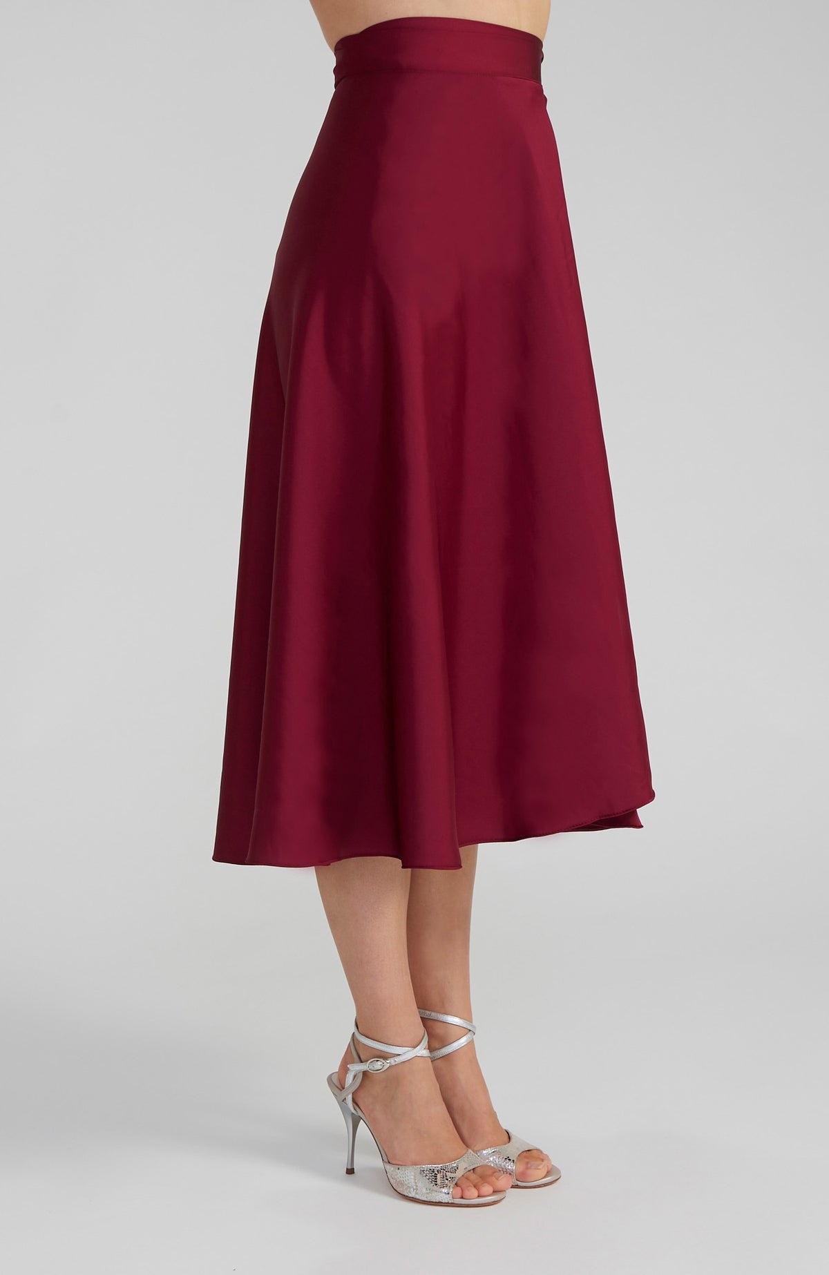 Long Bordeaux red satin wrap skirt GINA with a side-tie waist; an elegant Argentine tango skirt designed for a flowing, elongated silhouette.
