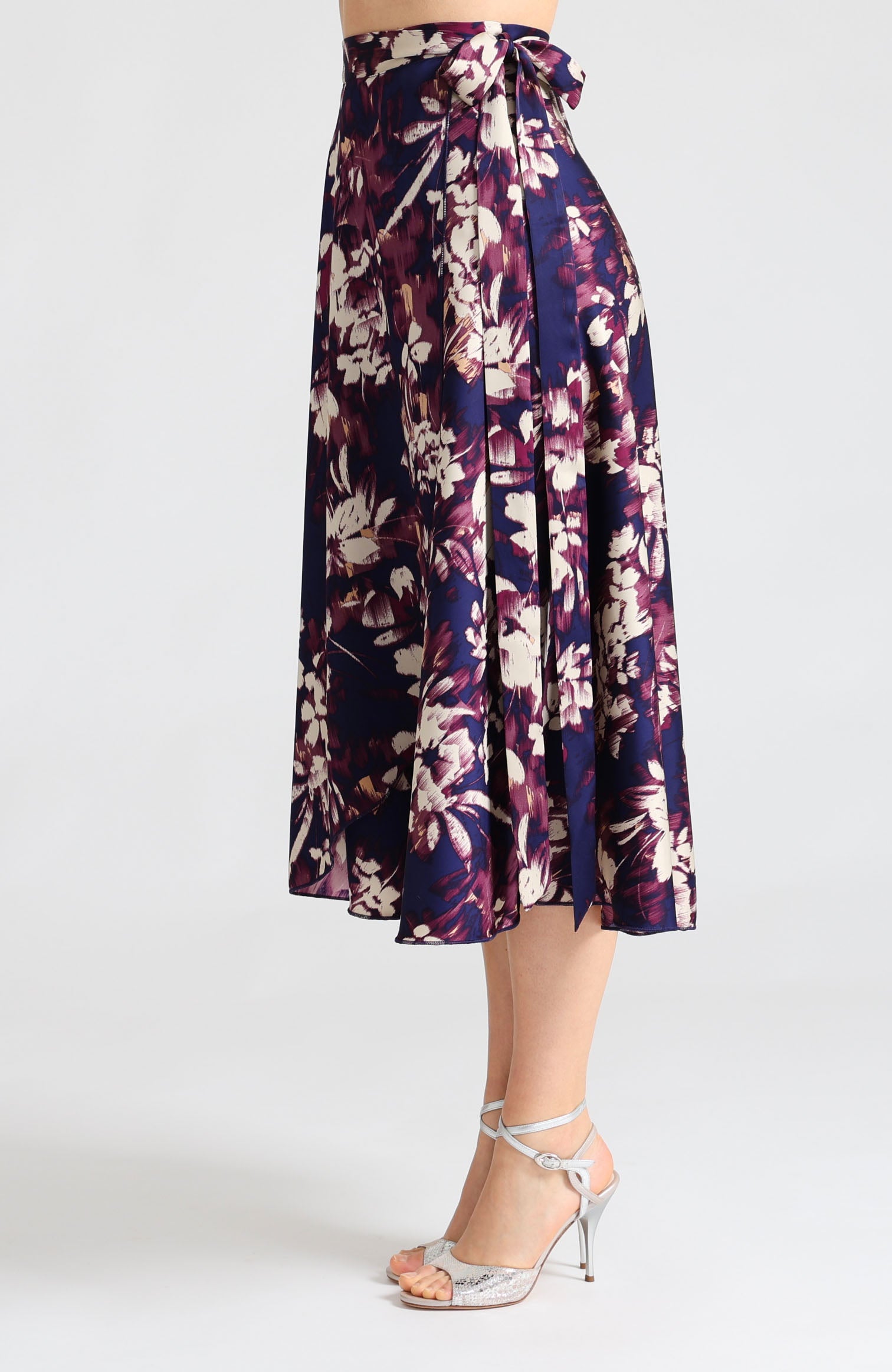 Long wrap tango skirt in blue abstract print with bow – vibrant artistic design highlighting leg movement GINA.