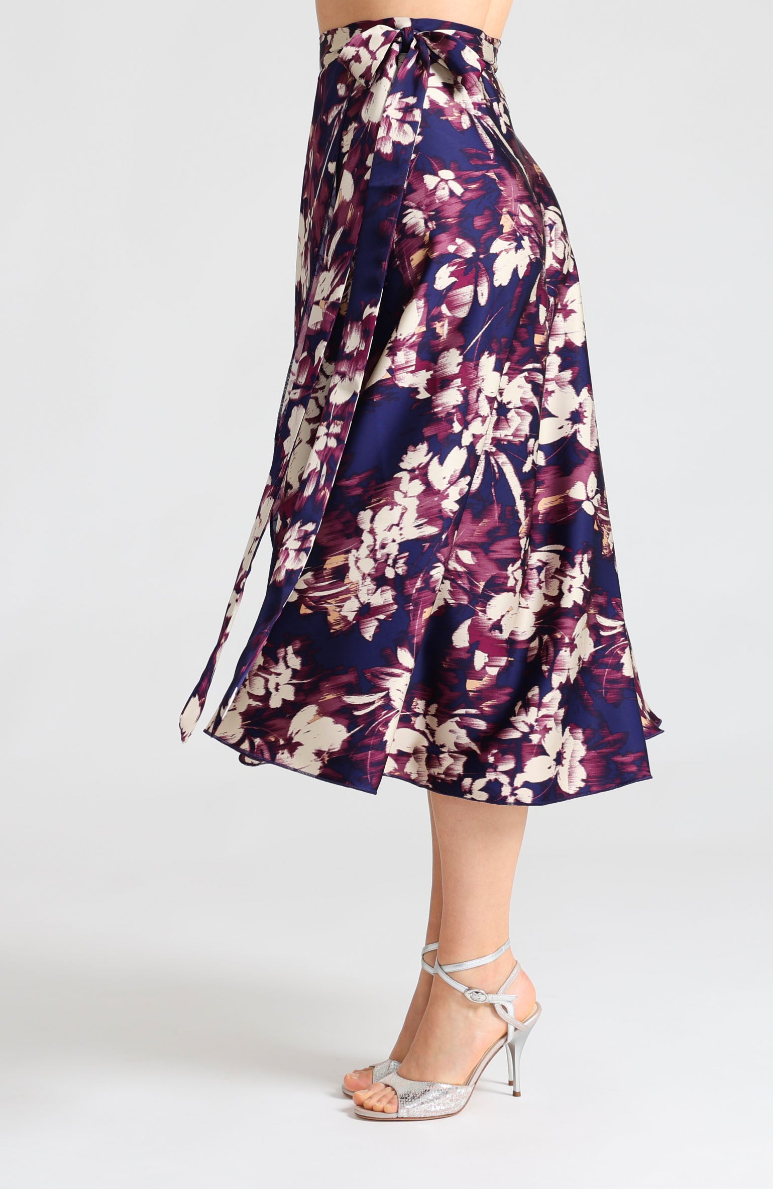 Long wrap tango skirt in blue abstract print with bow – vibrant artistic design highlighting leg movement GINA.