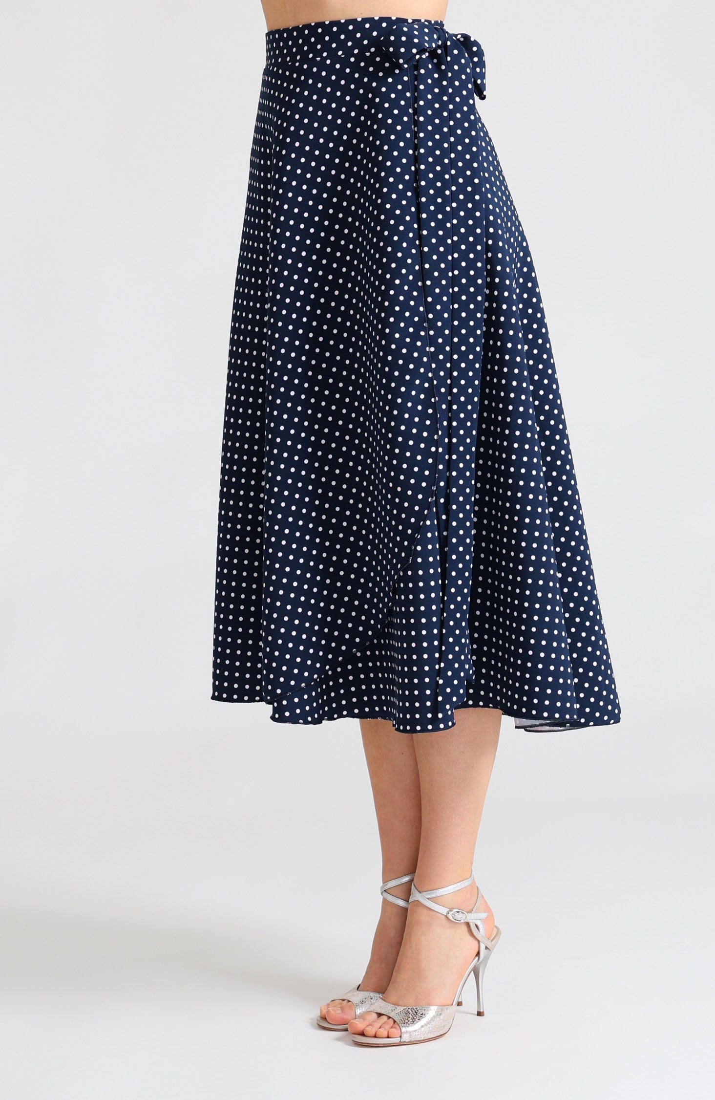 Long wrap tango skirt in navy blue with white polka dots – A-line wrap design.