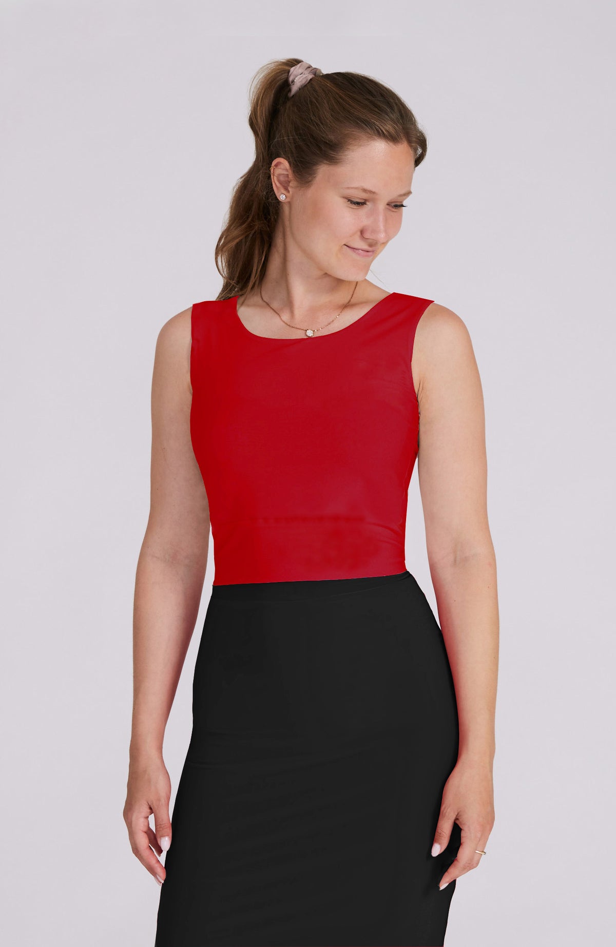 Model wearing the ZOE red tango top with a bateau neckline.