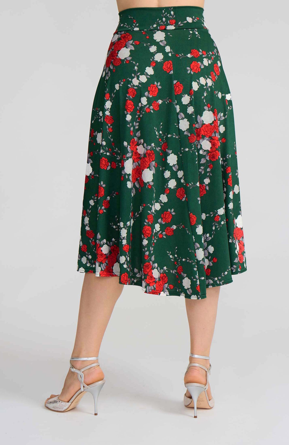 Model wearing the AUDREY red rose print on green A-line tango skirt.