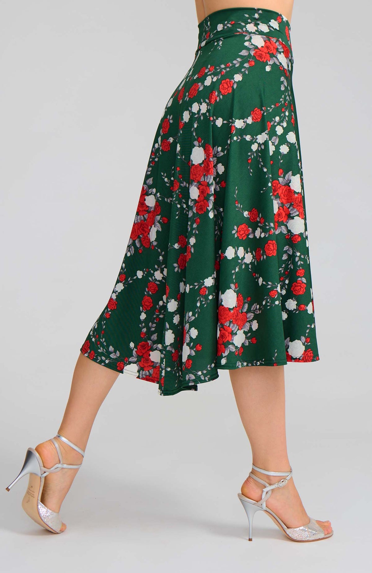 Model wearing the AUDREY red rose print on green A-line tango skirt.
