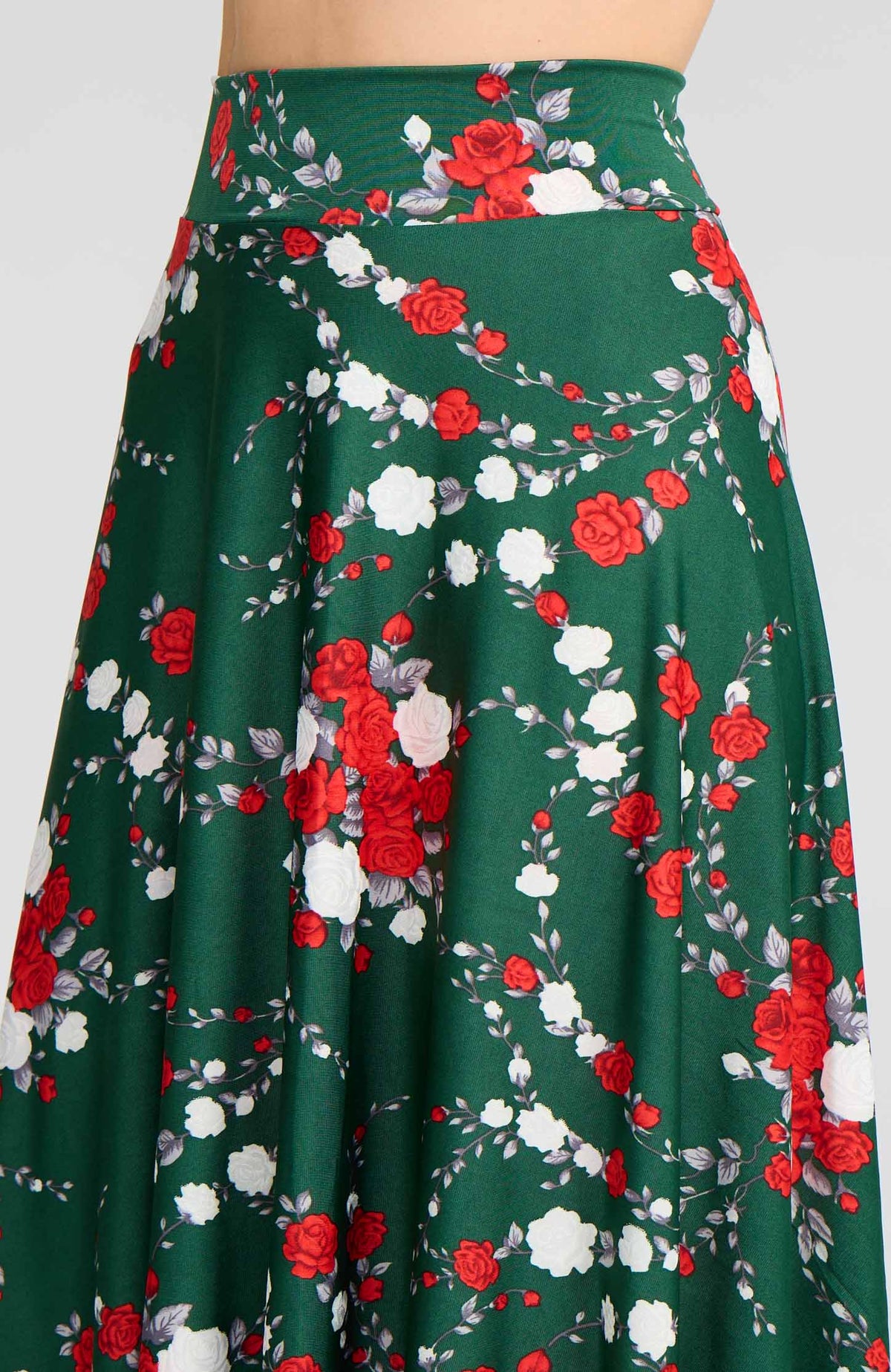 Model wearing the AUDREY red rose print on green A-line tango skirt.