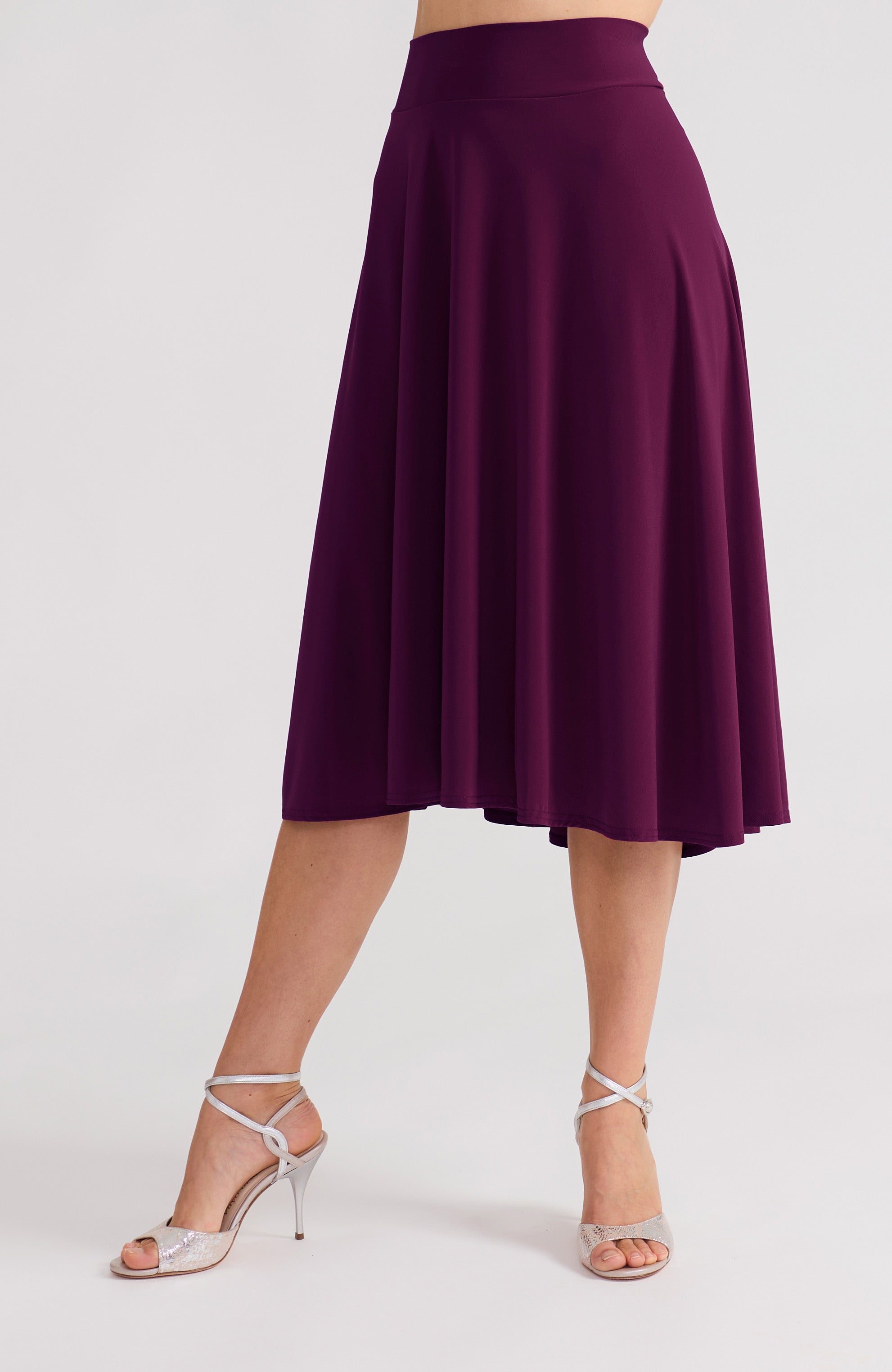 Violet A-line tango skirt AUDREY with a flowing high-low hem in a solid purple tone.