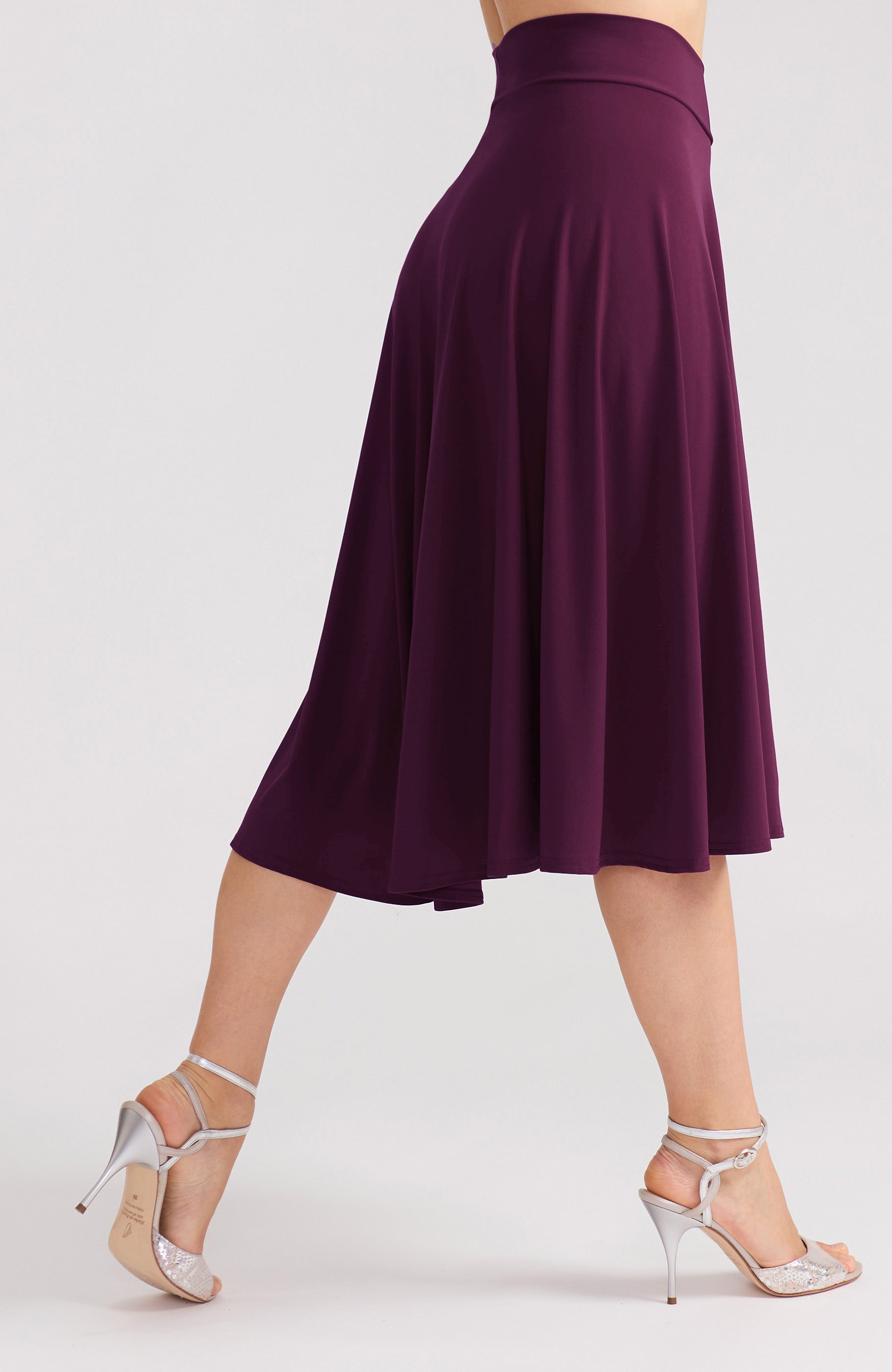 Violet A-line tango skirt AUDREY with a flowing high-low hem in a solid purple tone.