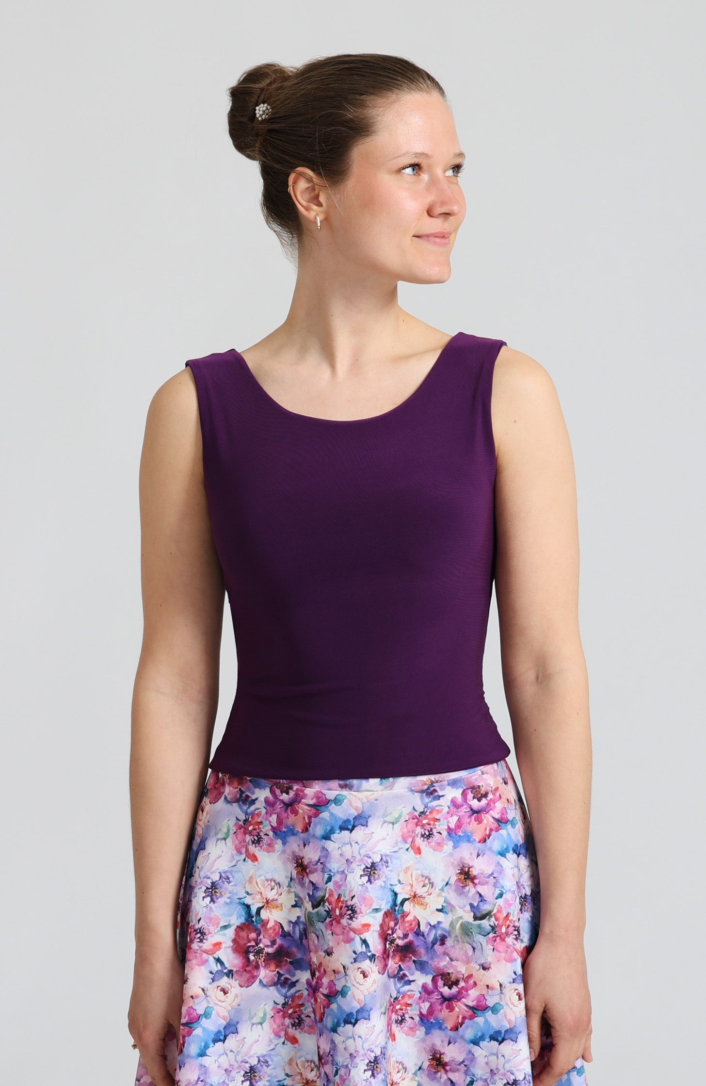 Elegant violet tango top with bateau neckline.