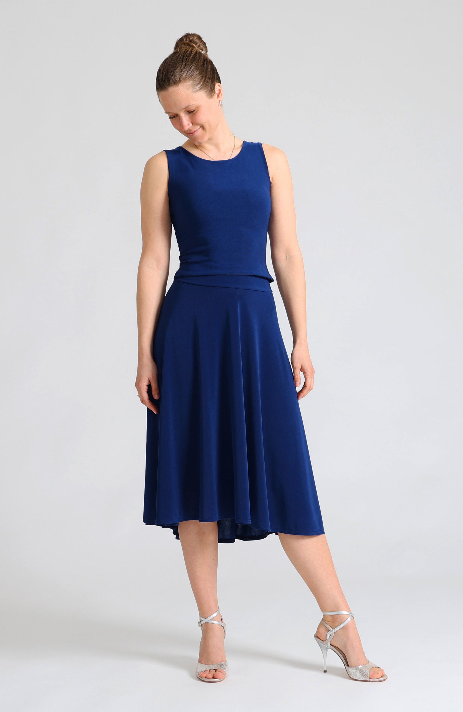 Blue crop top DANIELA with a bateau neckline and open V-back paired with a blue A-line tango skirt.
