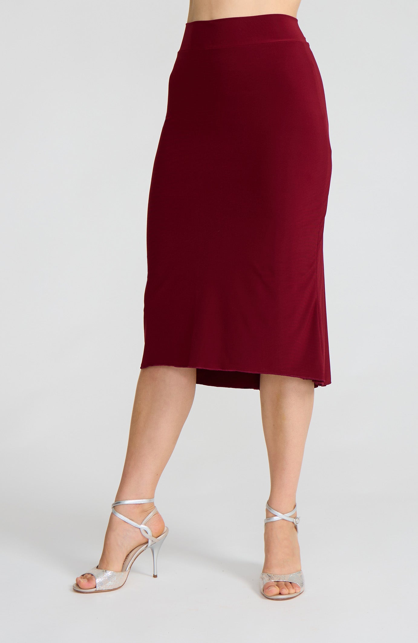 Model wearing the JAZMIN bordeaux red godet tango skirt.