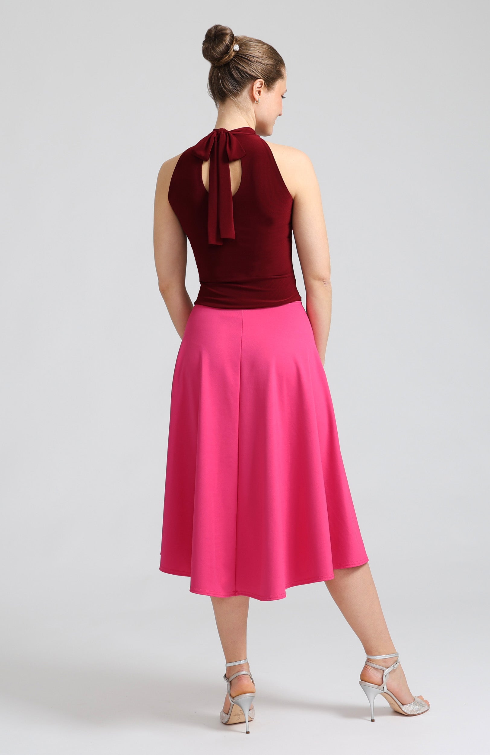 Bordeaux red halter neck tango top Lynn with elegant back bow detail and sleek fit paired with a pink tango skirt with A-line design.