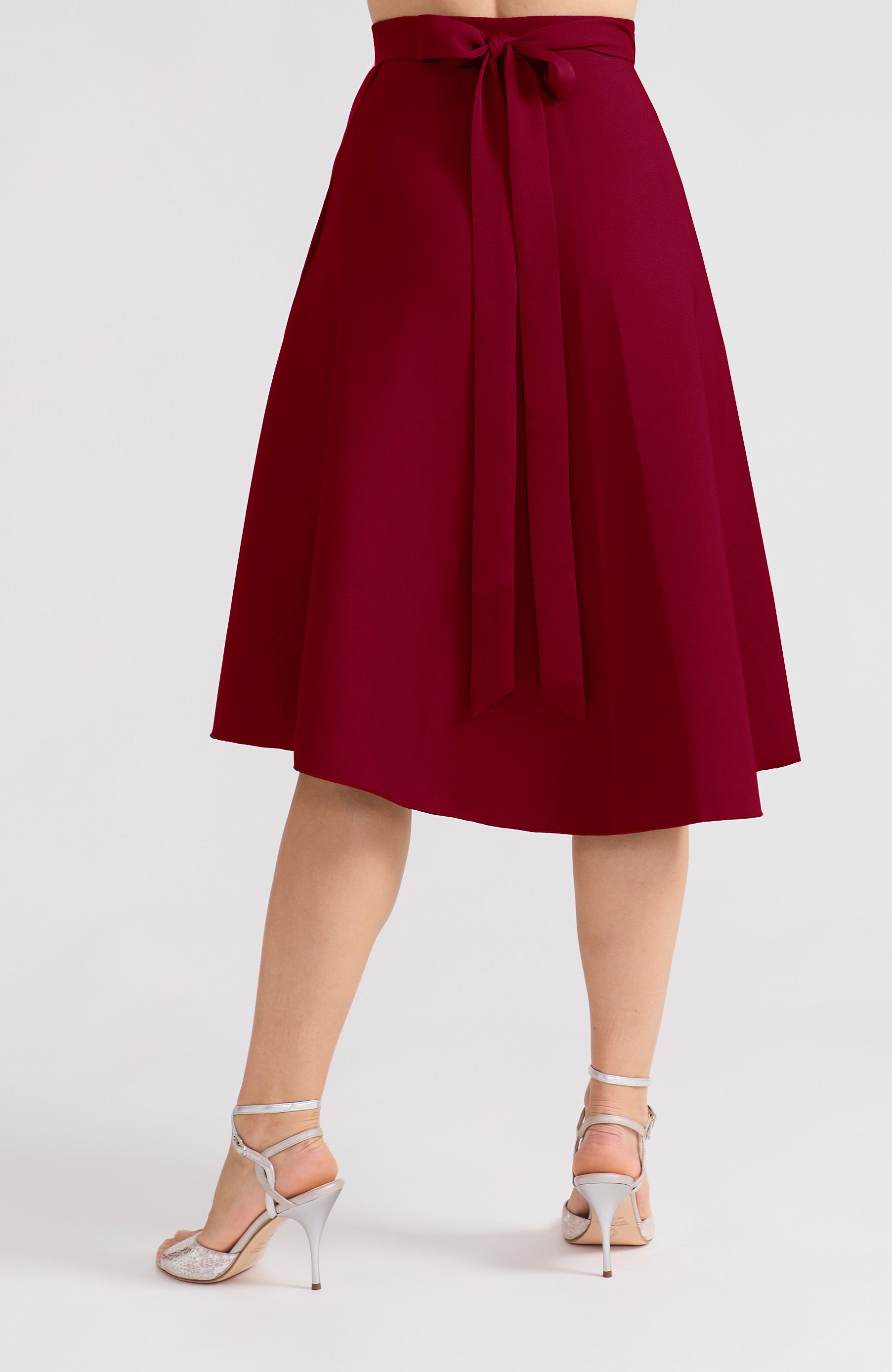 Elegant Argentine tango skirt in bordeaux red with bow.
