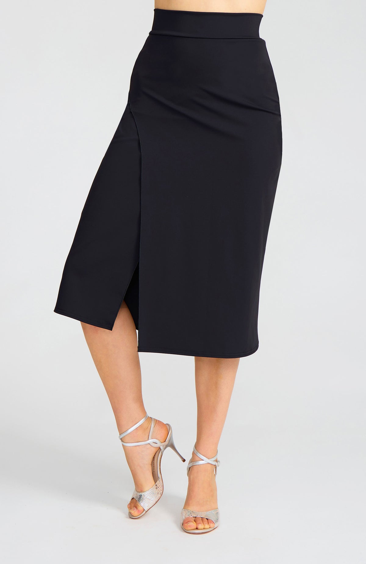 Model wearing the VALERY charcoal black overlap tango skirt on the dance floor.