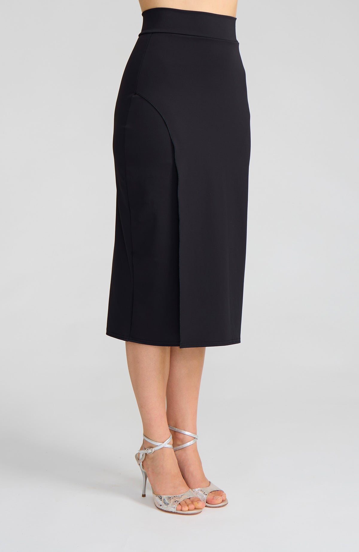 Model wearing the VALERY charcoal black overlap tango skirt on the dance floor.