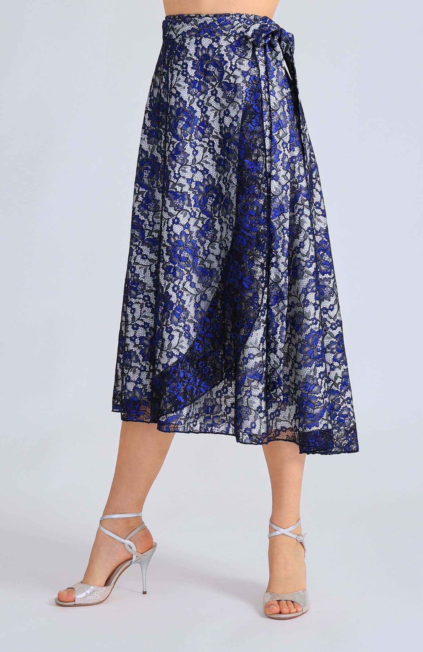 Long blue lace wrap skirt GINA with a soft white lining and an adjustable tie waist, showcasing an elegant flowing silhouette for tango dancing.