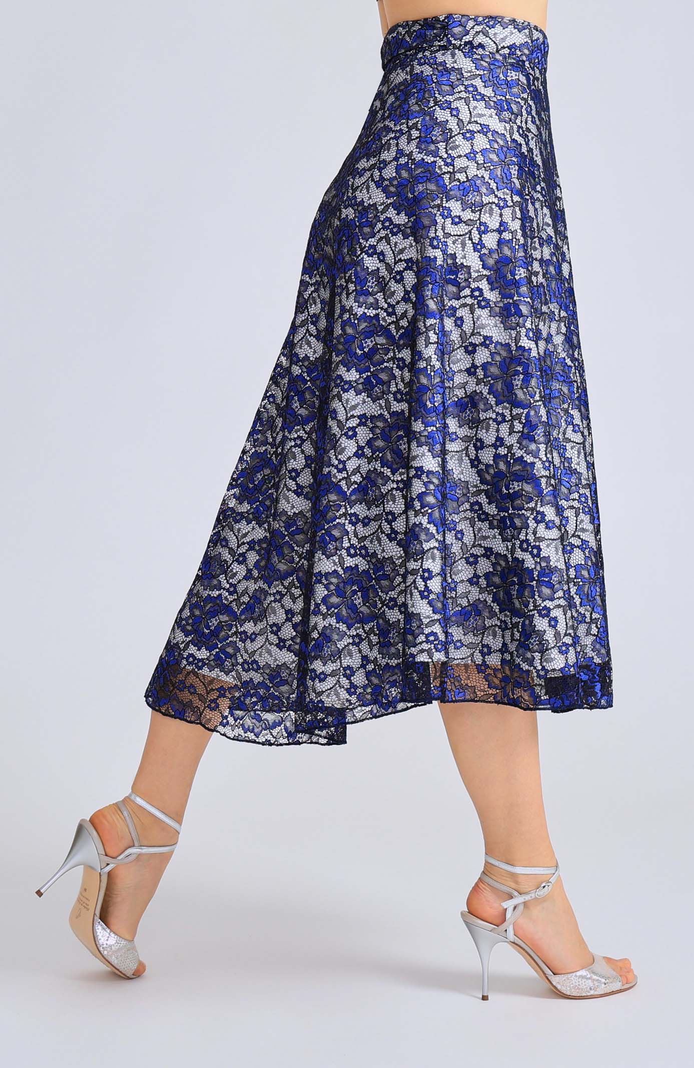 Long blue lace wrap skirt GINA with a soft white lining and an adjustable tie waist, showcasing an elegant flowing silhouette for tango dancing.