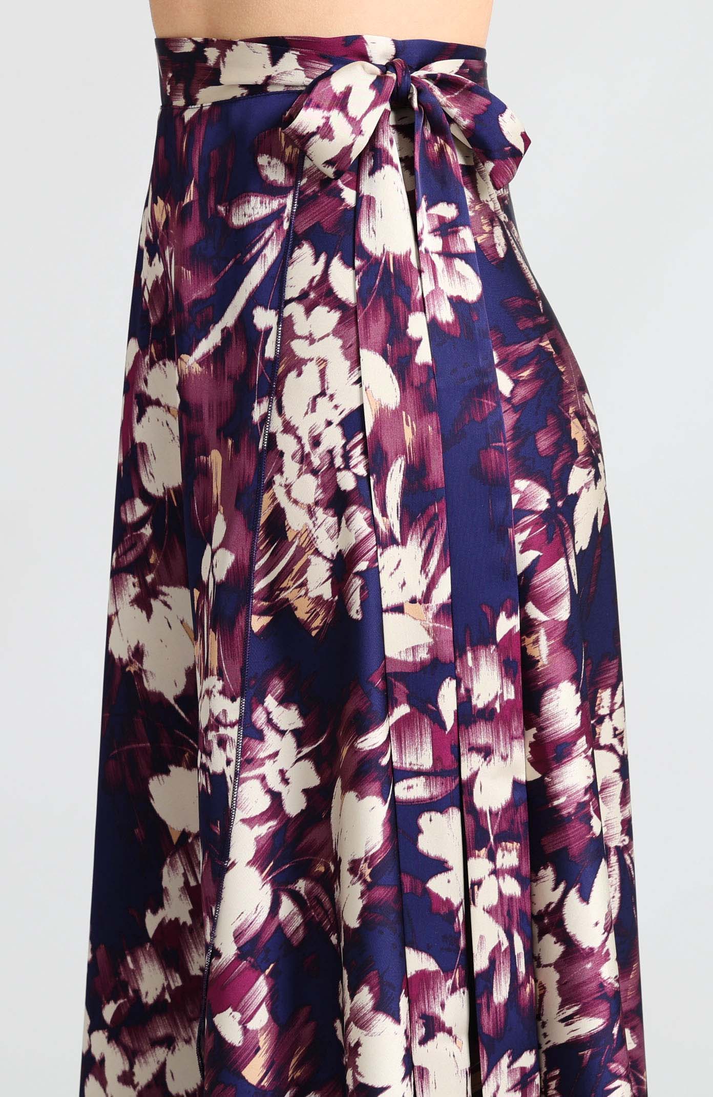 Long wrap tango skirt in blue abstract print with bow.