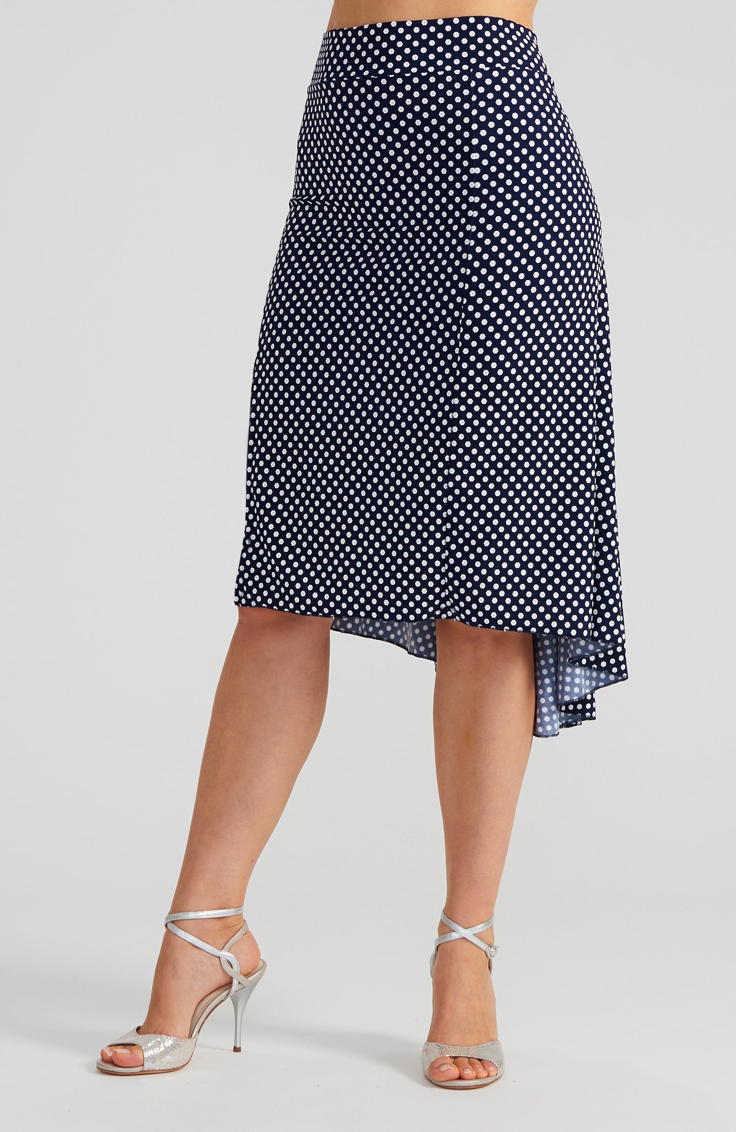 Navy blue and white polka dot tango skirt PAOLA with a front slit and fishtail back; a slim-fit stretch dance skirt with a dramatic high-low silhouette.