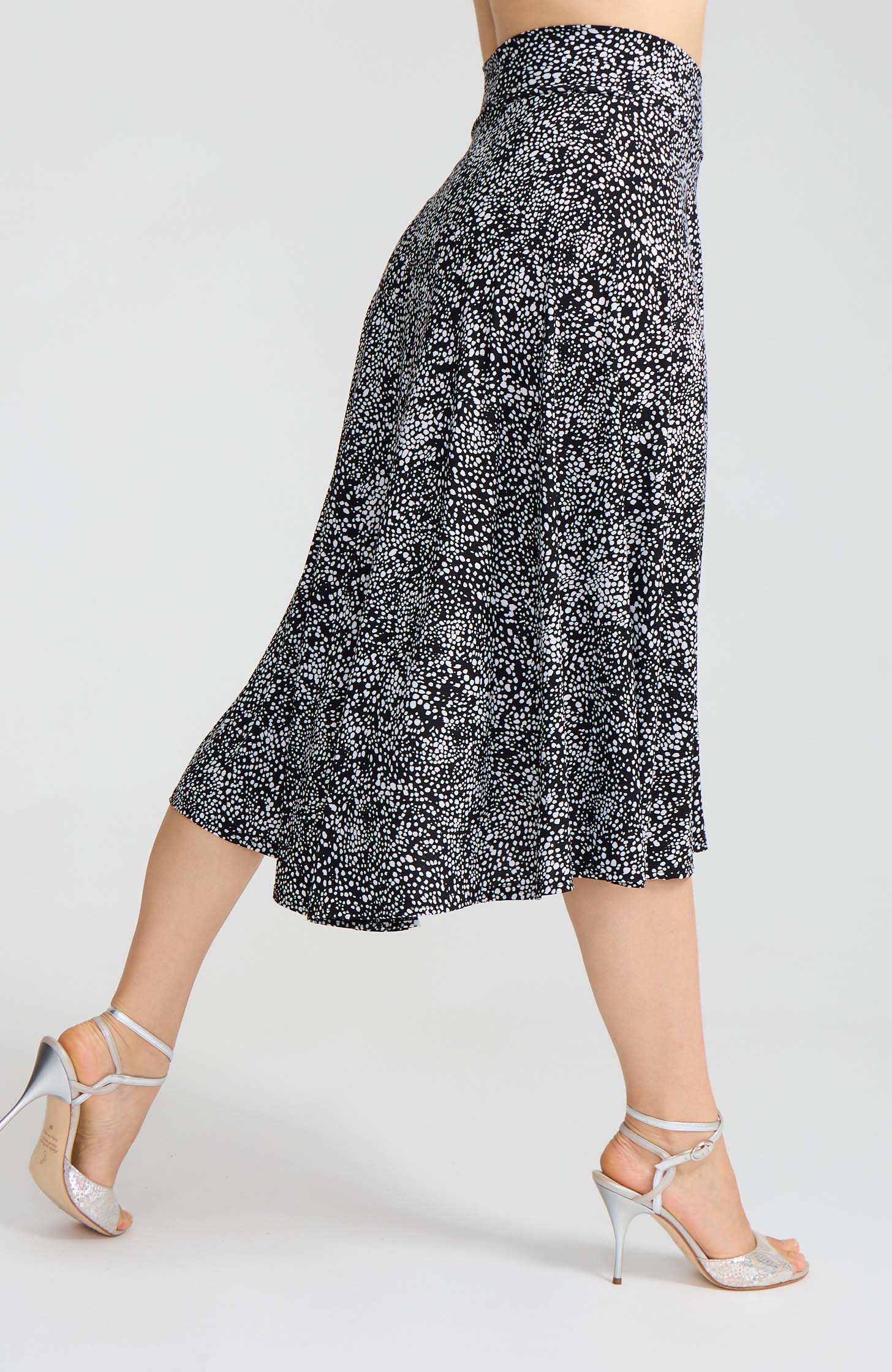 Model wearing the AUDREY black and white polka dot A-line tango skirt.
