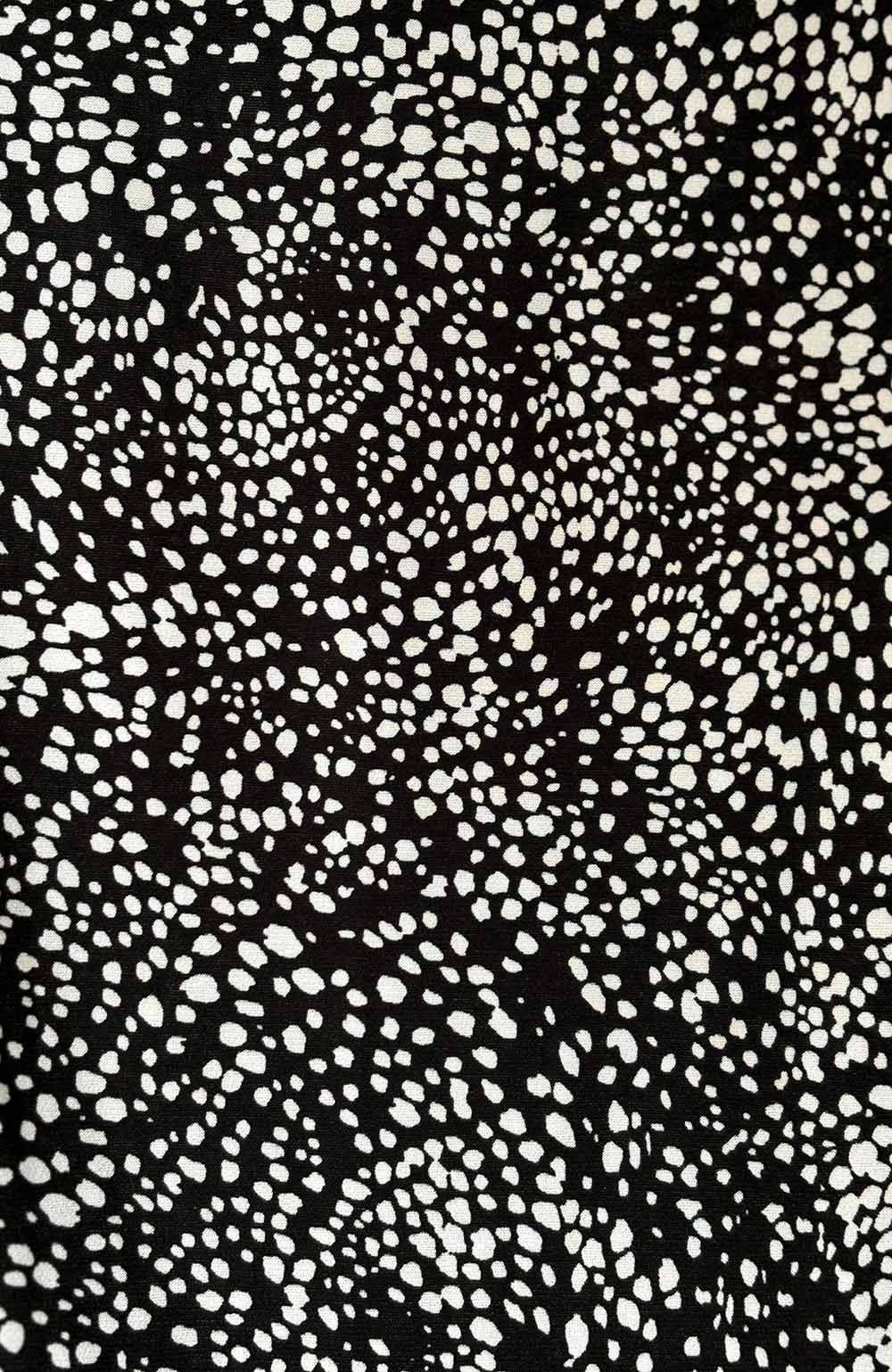 Black and white polka dot print.