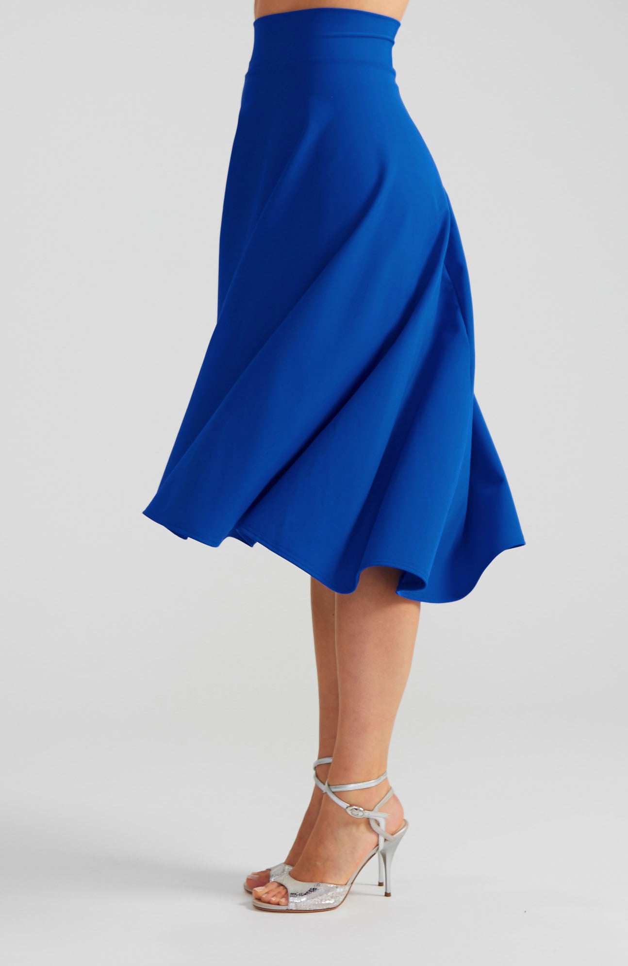 Royal blue A-line Argentine tango skirt AUDREY with a flowing high-low hem.