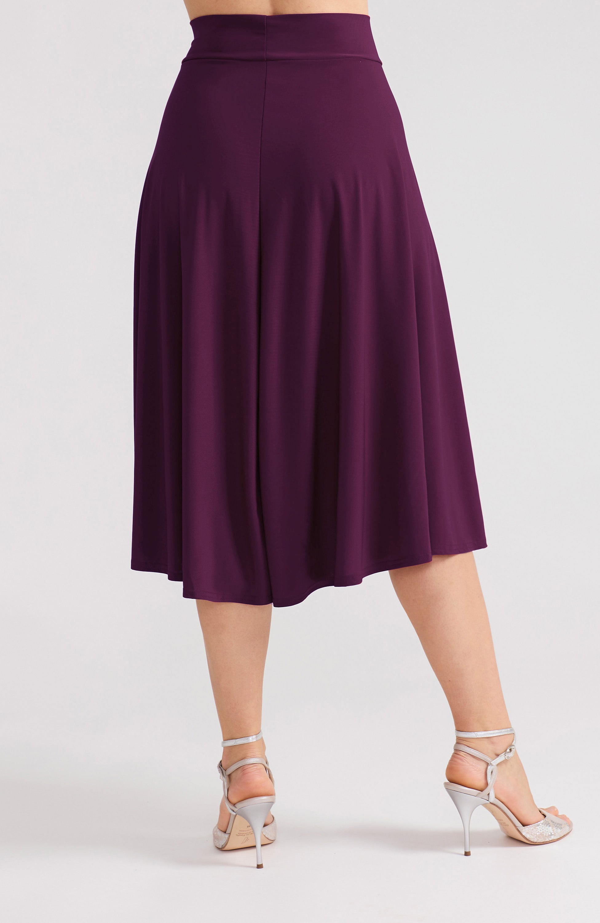 Violet A-line tango skirt AUDREY with a flowing high-low hem in a solid purple tone.