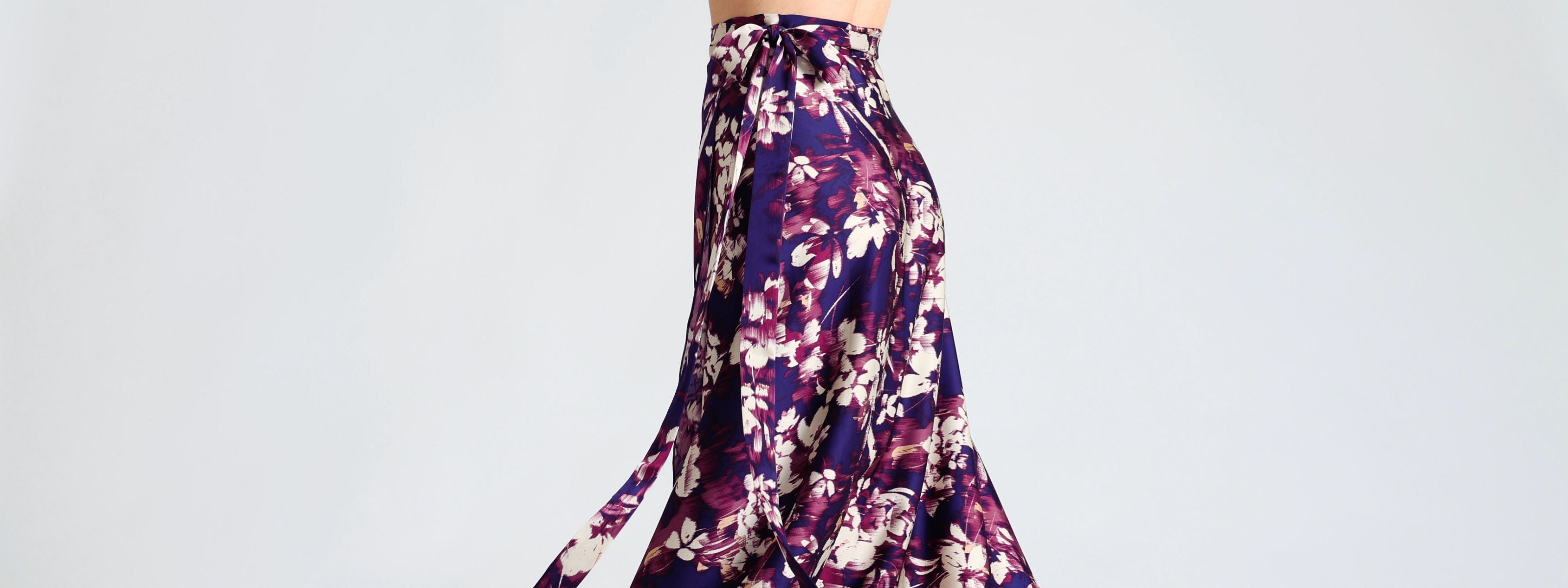 Long wrap tango skirt in blue abstract print – vibrant artistic design highlighting leg movement GINA.